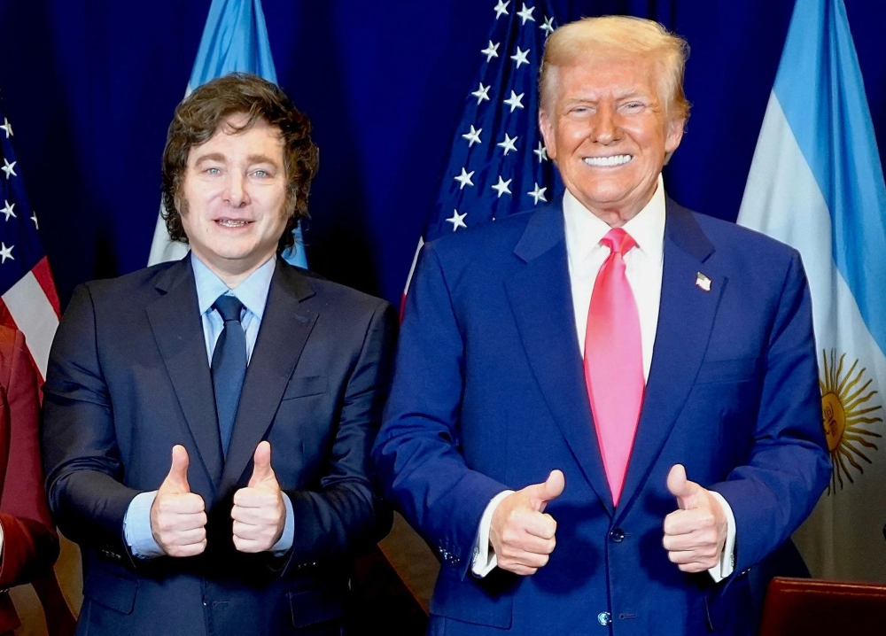 Handout picture released by the Argentinian Presidency shows Argentina's President Javier Milei and US President Donald Trump posing for a picture in the framework of the annual Conservative Political Action Conference (CPAC). — Pic by AFP 