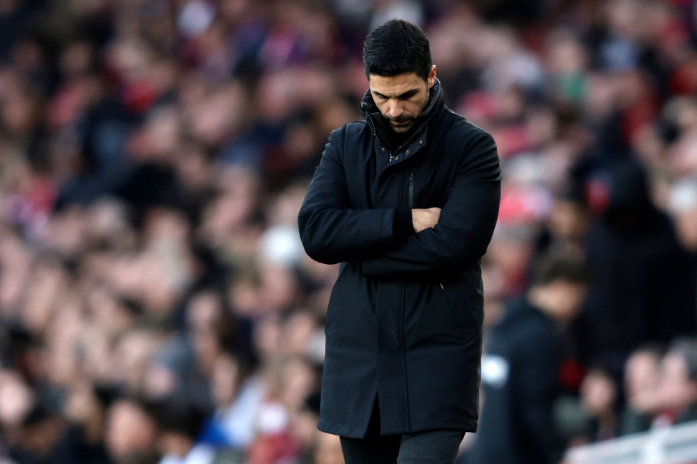 Mikel Arteta reacts after Arsenal's Premier League title bid suffered a huge blow as West Ham earned a shock 1-0 win. — Pic by AFP