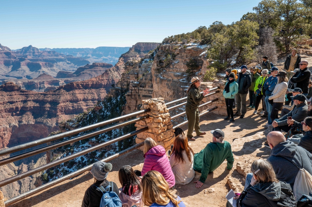 Grand Canyon Park Services Ranger Jill Staurowsky giving a tour to visitors. — AFP pic 