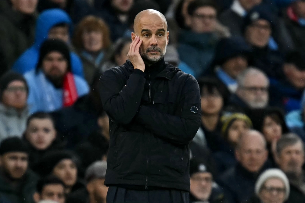 Manchester City's Spanish manager Pep Guardiola reacts during the English Premier League football match between Manchester City and Liverpool at the Etihad Stadium in Manchester February 23, 2025. — AFP pic