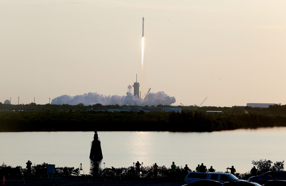 A SpaceX Falcon 9 rocket lifts off carrying 53 Starlink internet satellites, from the Kennedy Space Center in Cape Canaveral, Florida May 18, 2022. — Reuters pic 