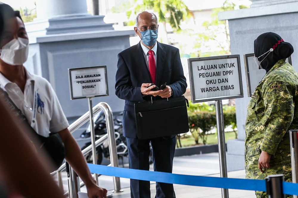 A file photograph shows former 1Malaysia Development Berhad (1MDB) chairman Tan Sri Mohd Bakke Salleh arriving at the Kuala Lumpur Court Complex on April 12, 2022. - Picture by Hari Anggara