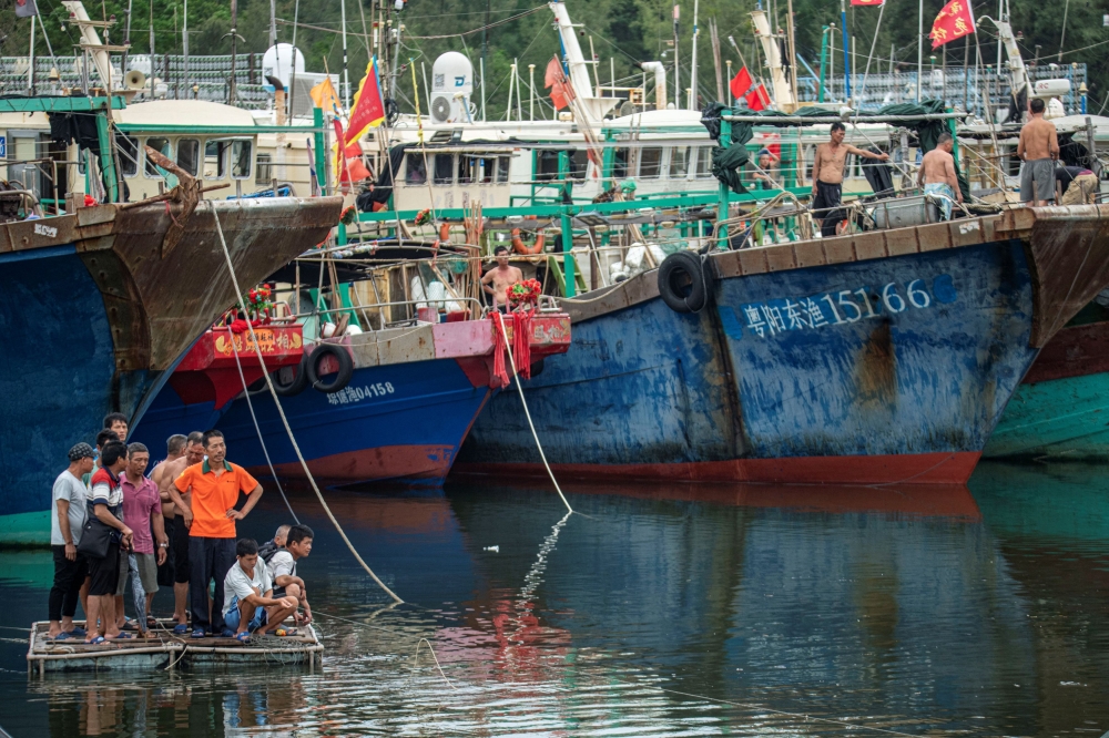File picture of fishing boats seen anchored at Tanmen port in Qionghai, Hainan province, China July 16, 2023. North Koreans have been forced to work on Chinese-flagged fishing vessels without touching land for as long as a decade, facing verbal and physical abuse as well as harsh conditions, a report said today. — cnsphoto handout pic via Reuters 