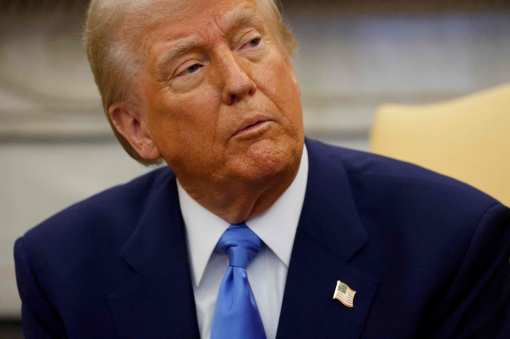 Donald Trump’s sweeping shakeup of the Pentagon, firing top officers and moving to lay off thousands of civilian has pushed the Pentagon into the political spotlight, with Democrats accusing Trump and Defence Secretary Pete Hegseth of seeking to politicise the military. — Pic by AFP 
