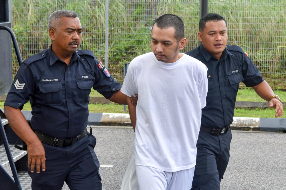 Hafizul Hawari, was sentenced to a total of 14 years and six months in prison and six lashes by the Sessions Court here today on seven charges, including possession of a firearm in April last year. — Bernama pic
