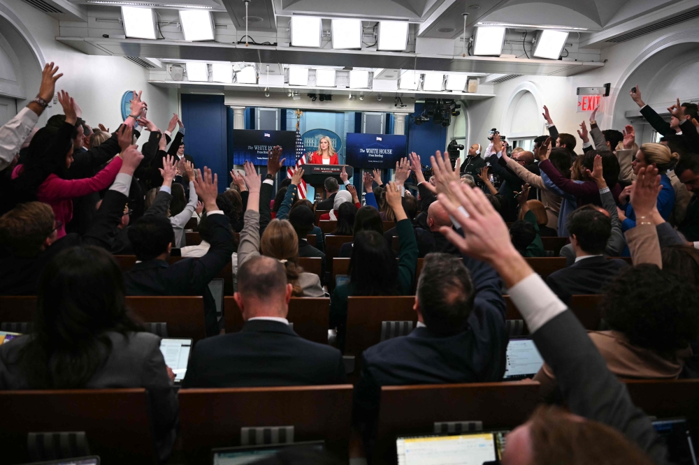 White House Press Secretary Karoline Leavitt (centre) takes questions during the daily briefing in the Brady Briefing Room of the White House in Washington, DC, on February 25, 2025. — AFP pic 