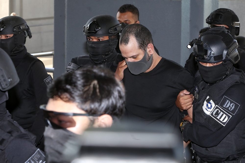 Israeli national Shalom Avitan was charged with trafficking six firearms and possessing four boxes of ammunition without an arms licence at a five-star hotel room between March 26 and March 28. — Picture by Choo Choy May.