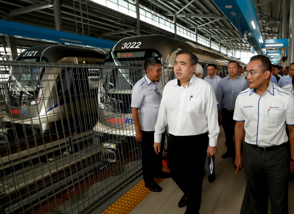 Transport Minister Anthony Loke surveys the LRT3 line construction in Pasar Jawa Station on July 29, 2024. — Bernama pic