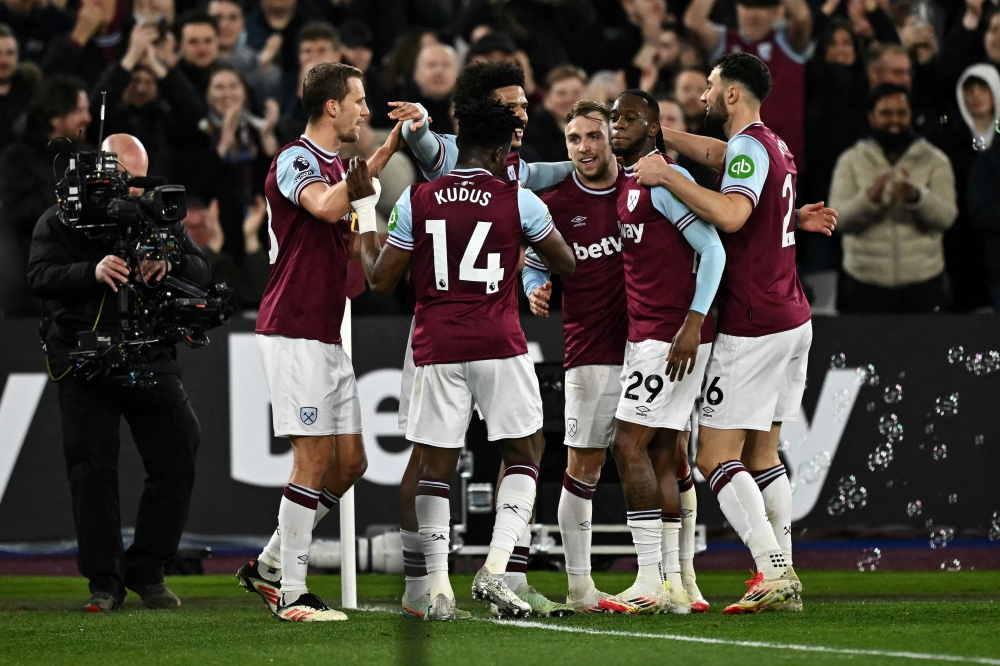 West Ham United’s Jarrod Bowen celebrates scoring the team's second goal — Pic by AFP