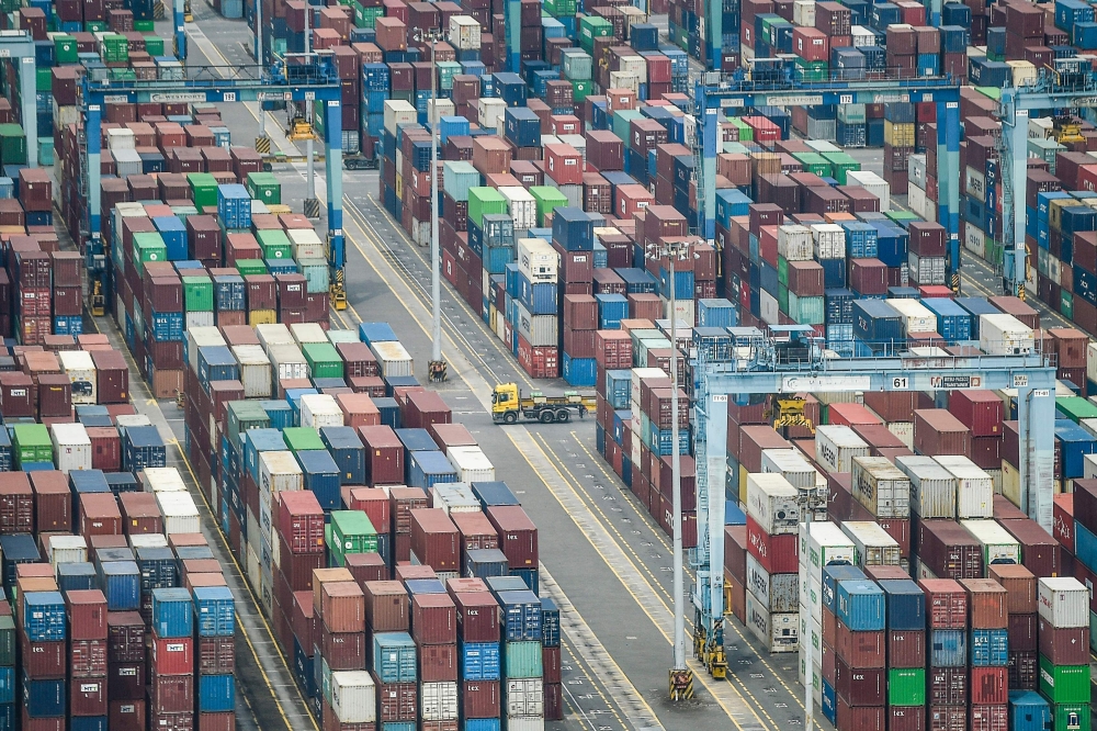 Shipping containers are seen stacked at the Westport Holdings Bhd port in Port Klang on July 14, 2024. — AFP pic