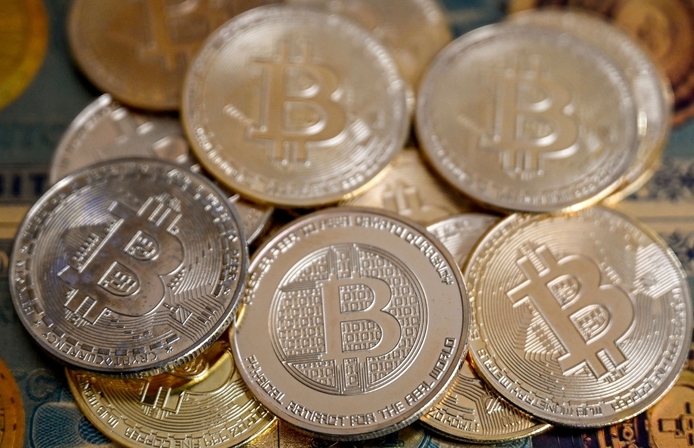This illustration photograph taken on November 22, 2024 in Istanbul shows coin imitations of Bitcoin. — AFP pic 