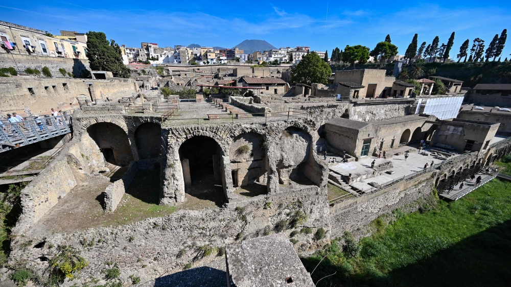A general view shows the archaeological site of Herculaneum in Ercolano, near Naples, with the Mount Vesuvius volcano in the background, on October 23, 2019. — AFP pic 