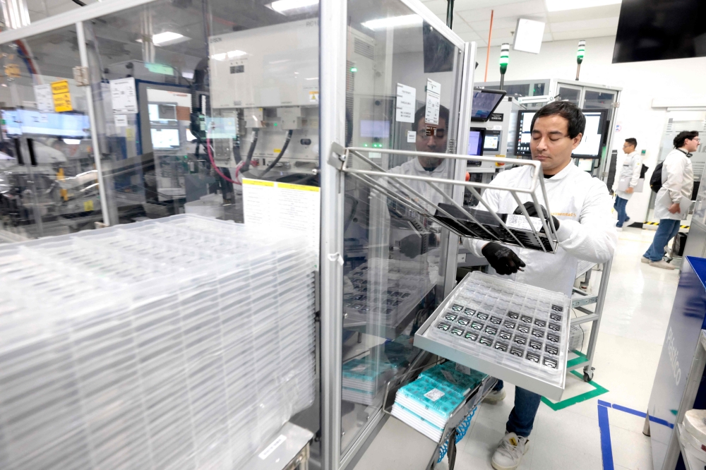 The production of key fobs used by millions each day is an example of the benefits of the USMCA free trade agreement between the United States, Canada, and Mexico, which has simplified manufacturing and supply chains. — AFP pic 