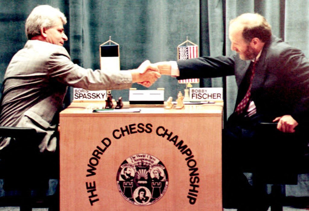 Russian-born chess master Boris Spassky (left) shakes hands with US master Bobby Fischer (right) at the beginning of their first match in the Hotel Maestral in Sveti Stefan, on September 2, 1992. — File photo by AFP