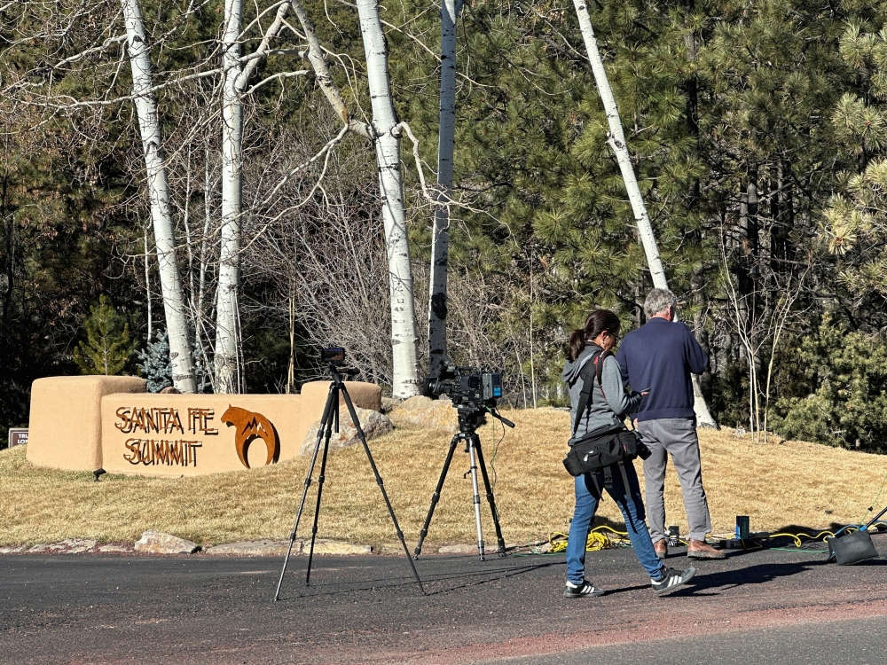Reporters gather outside the entrance to the gated community where actor Gene Hackman was found dead on Wednesday with his wife and dog, in Santa Fe, New Mexico, February 27, 2025. — Reuters pic