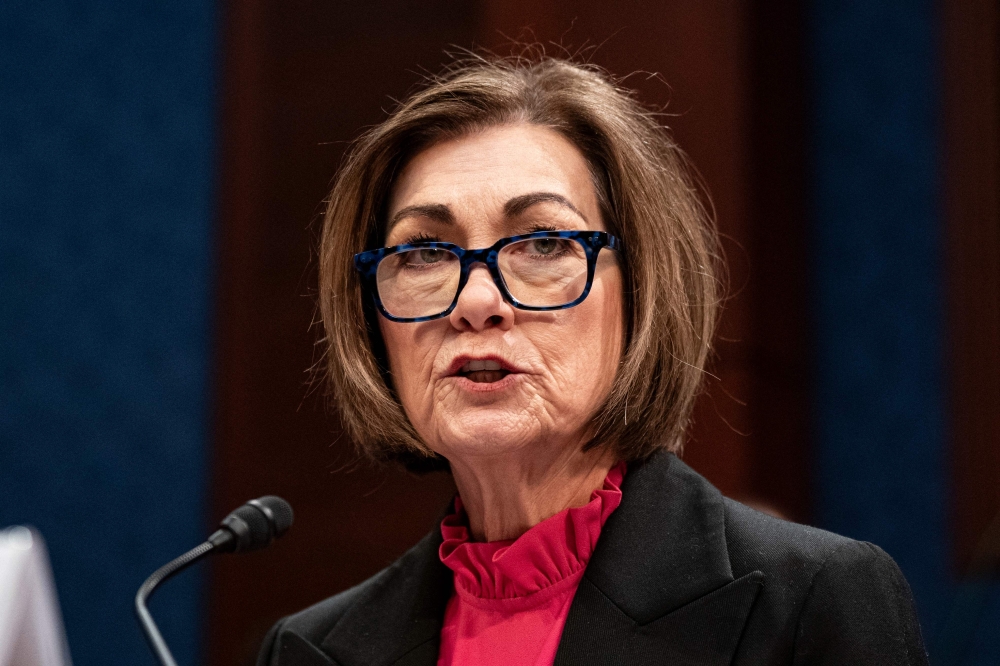 Republican Governor Kim Reynolds signed off on Iowa becoming the first US state to strip gender identity protection, removing safeguards for transgender people. — Pic by AFP