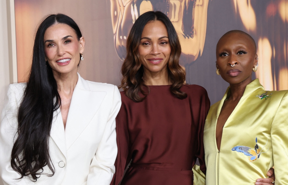 (From left) US actress Demi Moore, US actress Zoe Saldana and British singer and actress Cynthia Erivo arrive for the 97th Annual Academy Awards Nominees Dinner at the Academy Museum of Motion Pictures in Los Angeles February 25, 2025. — AFP pic