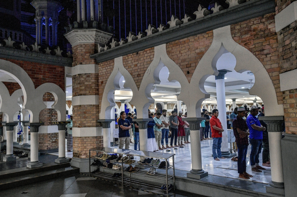 Muslims are seen performing the Tarawih prayers at Masjid Jamek in Kuala Lumpur, March 1, 2025. — Bernama pic