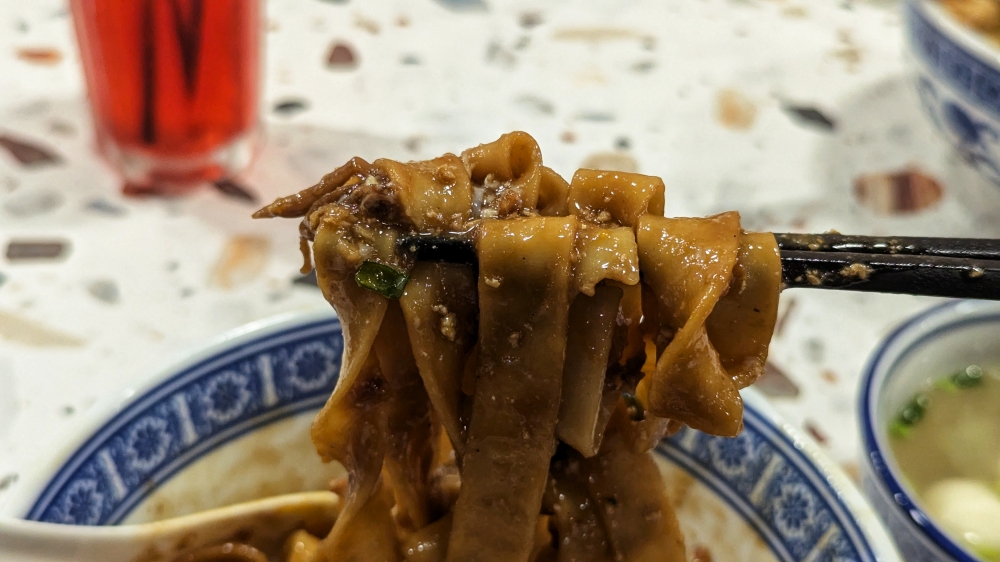 The sourdough ‘pan mee’ is best experienced with thick noodles, served dry style. — Picture by Ethan Lau