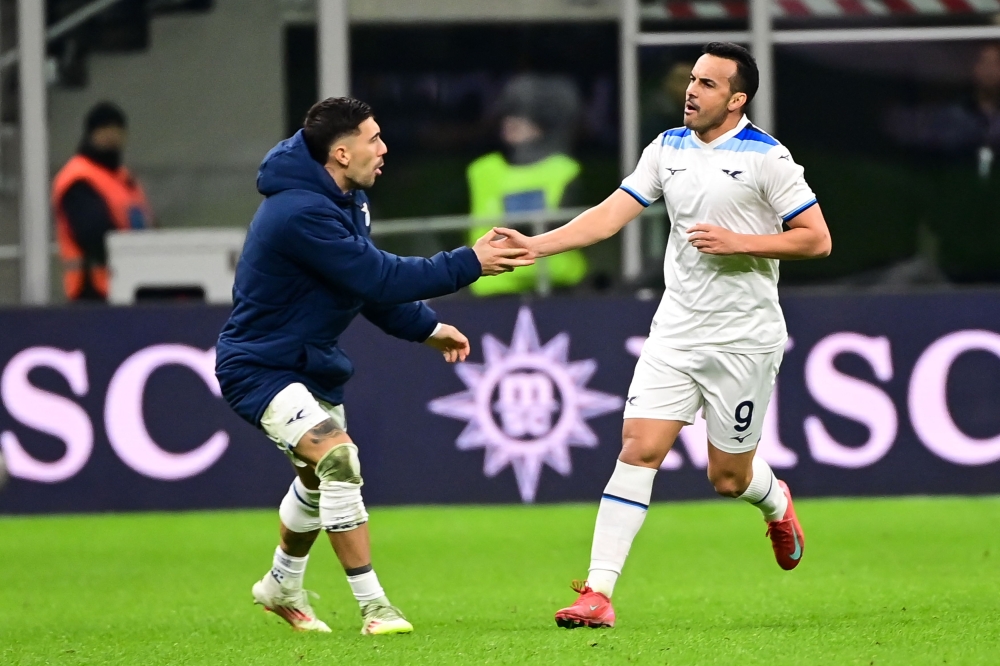 Lazio's Spanish forward #09 Pedro Rodriguez (R) celebrates scoring his team's second goal during the Italian Serie A football match between AC Milan and S.S Lazio at San Siro stadium in Milan. — AFP pic