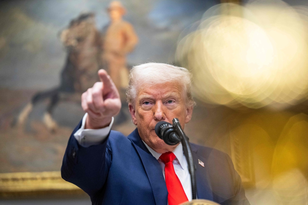 The White House also said Trump had inked an order to increase a previously imposed 10 percent tariff on China to 20 percent. — AFP pic