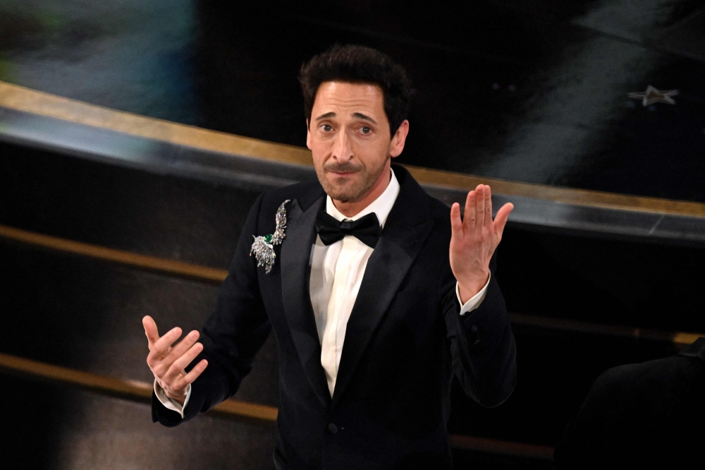 US actor Adrien Brody accepts the award for Best Actor in a Leading Role for 