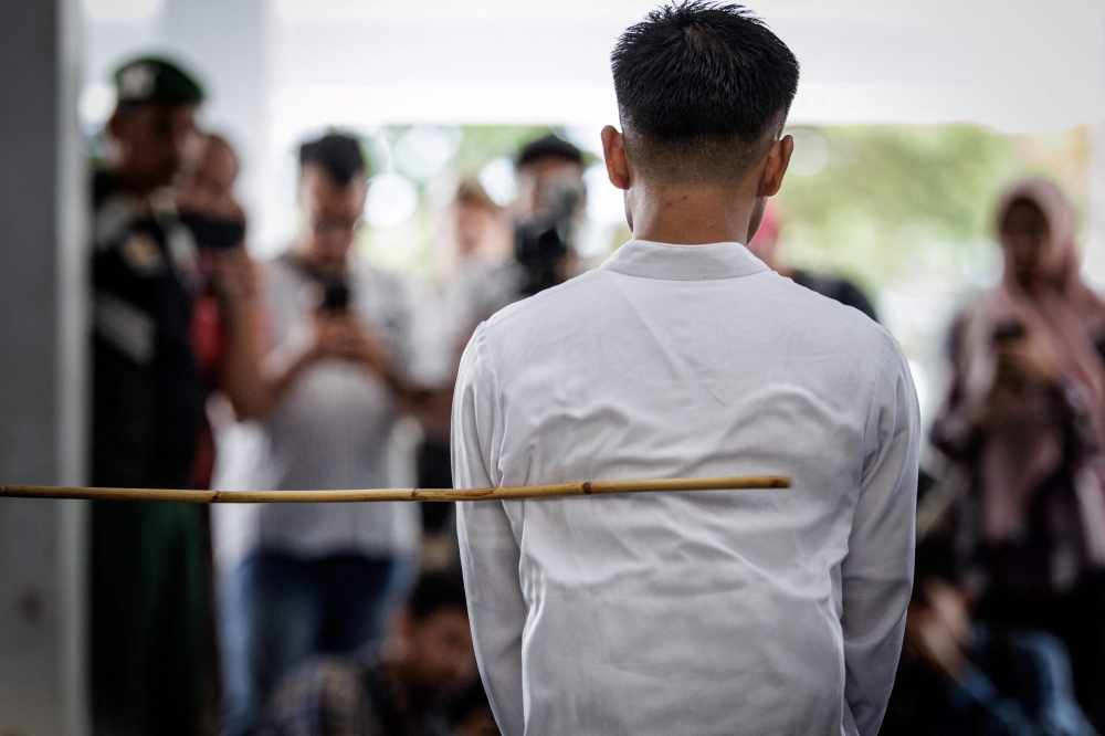 Scam cases in Singapore rose to 51,501 cases in 2024, accounting for 92.3 per cent of cybercrimes reported last year. — AFP pic