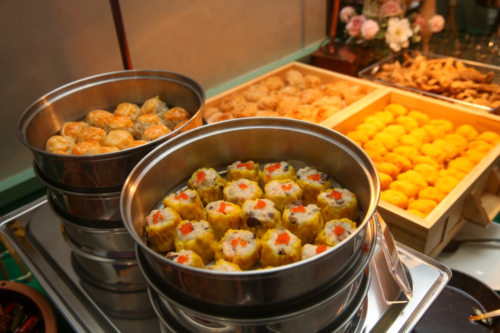 The highlight of Peony by Canton Boy's Buffet Berbuka Citrarasa Cina & Melayu is their handmade 'dim sum' like the Siu Mai King, Salted Egg Siu Mai, Fried Yam Croquette, paired with crowd favourite Keropok Lekor — Picture by Choo Choy May