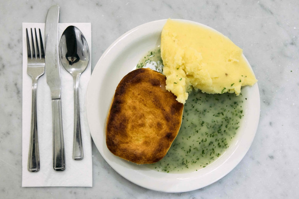 A picture shows a typical portion of pie and mash at G Kelly in east London on February 19, 2025. Londoners have been eating the classic Cockney combination, pie and mash since at least Victorian times, but for many years the working-class staple has had a humble reputation among outsiders. — AFP pic