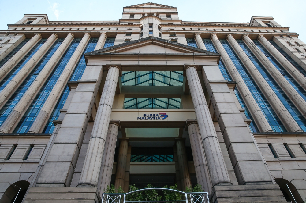 Bursa Malaysia’s benchmark index ended lower today, dragged down by continued selling pressure on selected heavyweights, led by the financial services sector. — Picture by Yusof Mat Isa