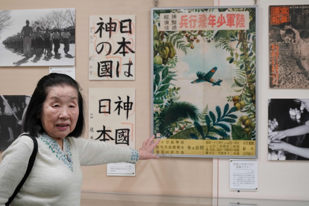 This photo taken on February 27, 2025 shows Shizuko Nishio, who will turn 86 on March 10, when Japan will commemorate 80 years after the bombing of Tokyo, introducing the exhibits at The Centre of the Tokyo Raids and War Damage in Tokyo. Five months before the United States dropped atomic weapons on Japan’s Hiroshima and Nagasaki, the nighttime raid on March 9-10, 1945 was World War II’s deadliest using conventional bombs. At least 80,000 people died, and likely more than 100,000, according to Japanese and US historians. — AFP pic
