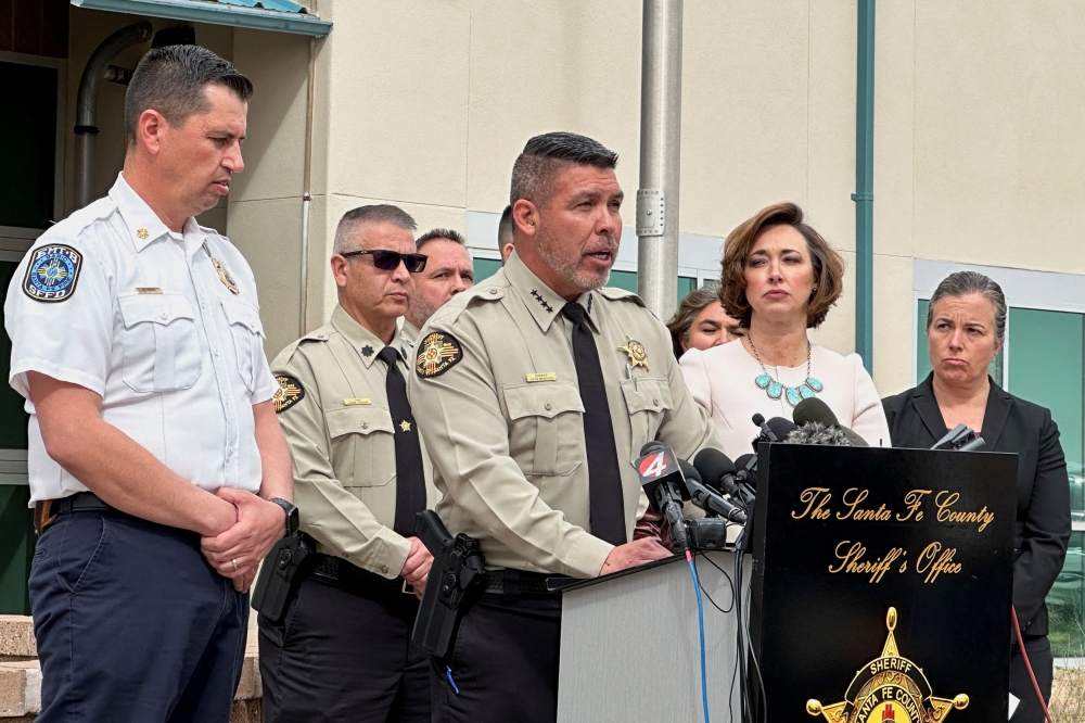Santa Fe County Sheriff's Office officials and New Mexico Office of the Medical Investigator officials hold a press conference in Santa Fe, New Mexico, March 7, 2025. — Reuters pic