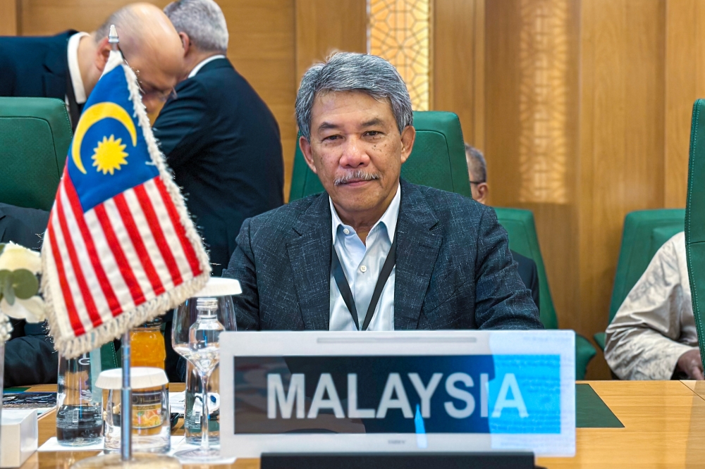 Foreign Minister Datuk Seri Mohamad Hasan attending the Extraordinary Session of the Organisation of Islamic Cooperation (OIC) Council of Foreign Ministers meeting on Friday. — Bernama pic