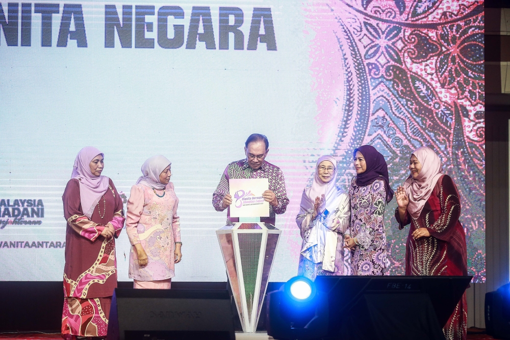 Prime Minister Datuk Seri Anwar Ibrahim along with wife Datuk Seri Dr Wan Azizah Wan Ismail officiate the launch of International Women's Day celebration World Trade Centre KL. — Picture by Sayuti Zainudin