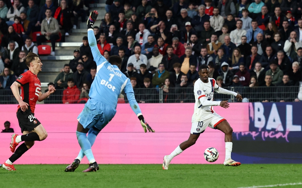 Paris St Germain’s Ousmane Dembele scores their third goal against Stade Rennes at Roazhon Park, Rennes, March 8, 2025. — Reuters pic 