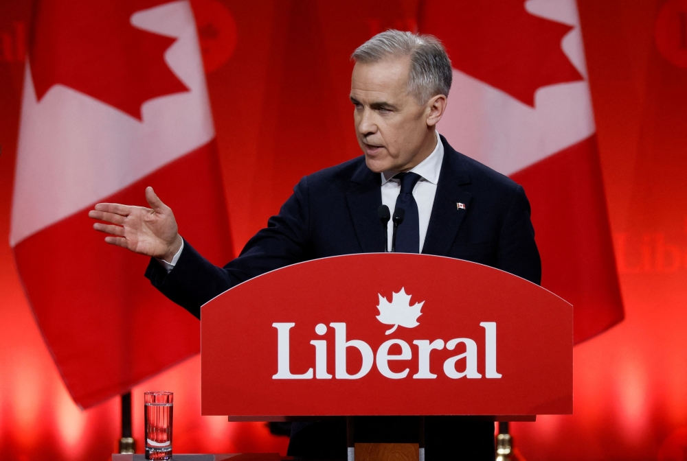 Former Bank of Canada and Bank of England governor Mark Carney won praise for his handling of the financial crisis, when he created new emergency loan facilities and gave unusually explicit guidance on keeping rates at record low levels for a specific period of time. — Reuters pic