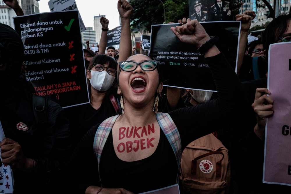 Protesters attend a demonstration against President Prabowo Subianto’s government, calling for various demands, including reviews of government budget cuts and the free nutritious meal programme for schools in front of a police barricade in Jakarta on February 21, 2025. Anger at the quality of life in South-east Asia’s biggest economy — a nation of 280 million known for pervasive corruption and nepotism — has stirred student protests and driven young and middle-aged professionals to seek jobs abroad. — AFP pic 