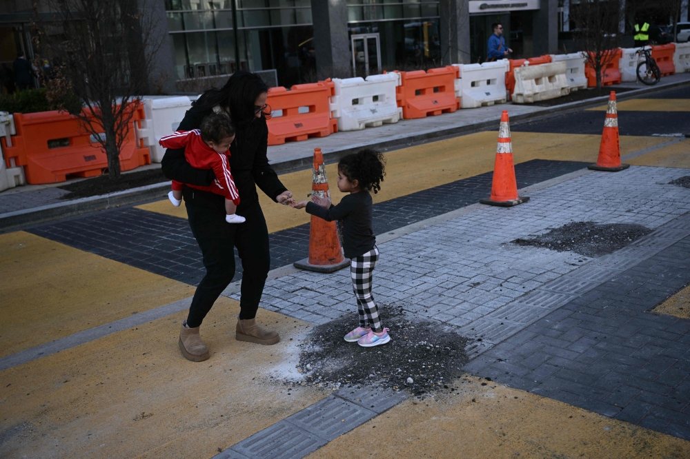 People remove pieces of the 