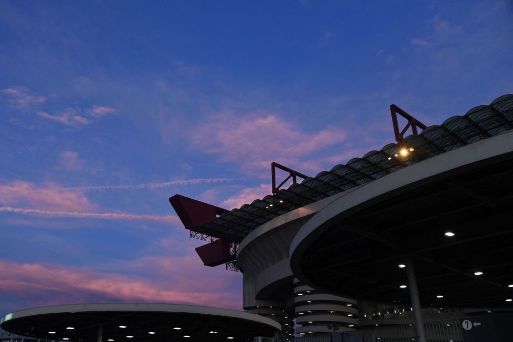 The sun sets over the San Siro stadium before the start of the Serie A football match between Inter MIlan and Juventus at the San Siro stadium in Milan, on February 4, 2024. — AFP pic