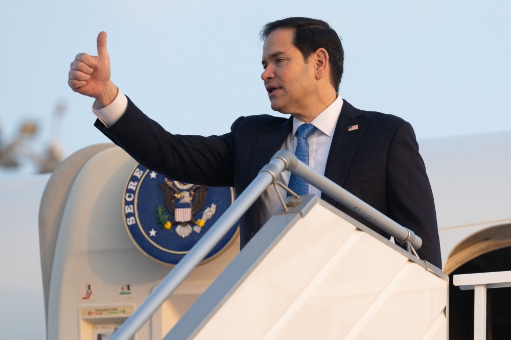 US Secretary of State Marco Rubio boards a military airplane prior to departing from King Abdulaziz International Airport in Jeddah, Saudi Arabia, March 12, 2025, as he travels to Canada for a G7 Foreign Ministers meeting. — AFP pic 