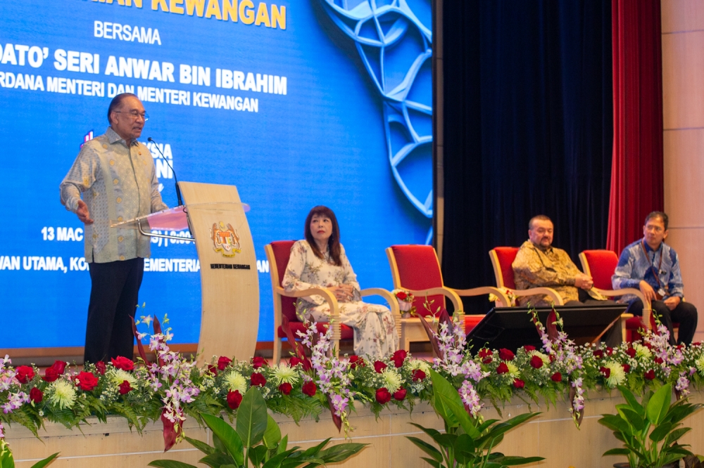 Prime Minister Datuk Seri Anwar Ibrahim addresses civil servants at the Ministry of Finance’s monthly assembly in Putrajaya on March 13, 2025. — Picture By Raymond Manuel