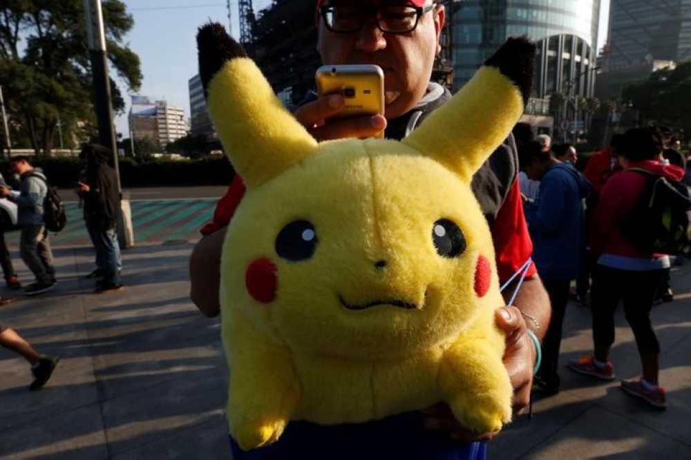 Niantic says more than 20 million people play Pokémon Go on an active basis weekly. — Reuters file pic