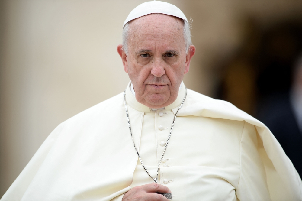 Pope Francis attends his weekly general audience in St Peter's Square at the Vatican on September 10, 2014. — AFP pic 