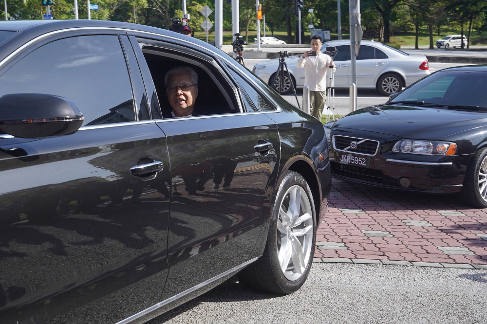 A vehicle carrying Datuk Seri Ismail Sabri Yaakob is seen outside the Malaysian Anti-Corruption Commission (MACC) headquarters in Putrajaya on March 13, 2025. — Bernama pic