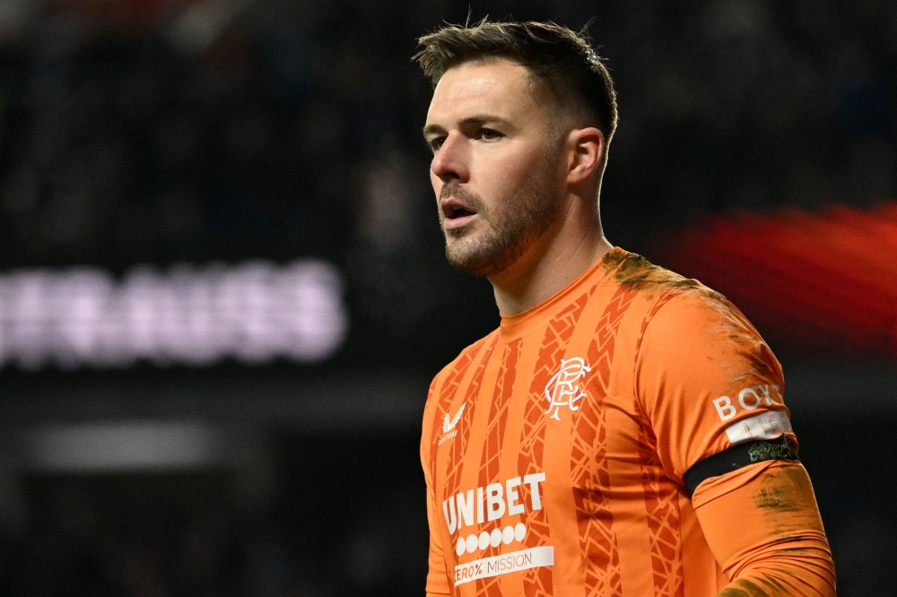 Rangers' English goalkeeper Jack Butland reacts after saving a penalty shot during the UEFA Europa League second-leg round of 16 match today. — AFP pic