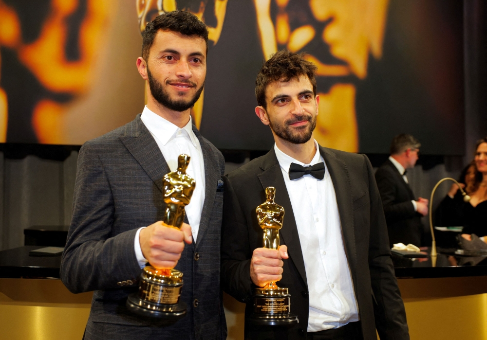 Basel Adra and Yuval Abraham pose with the Oscar for Best Documentary Feature Film for 'No Other Land' at the Governors Ball following the Oscars show at the 97th Academy Awards in Hollywood, Los Angeles, California, U.S., March 2, 2025. — Reuters pic