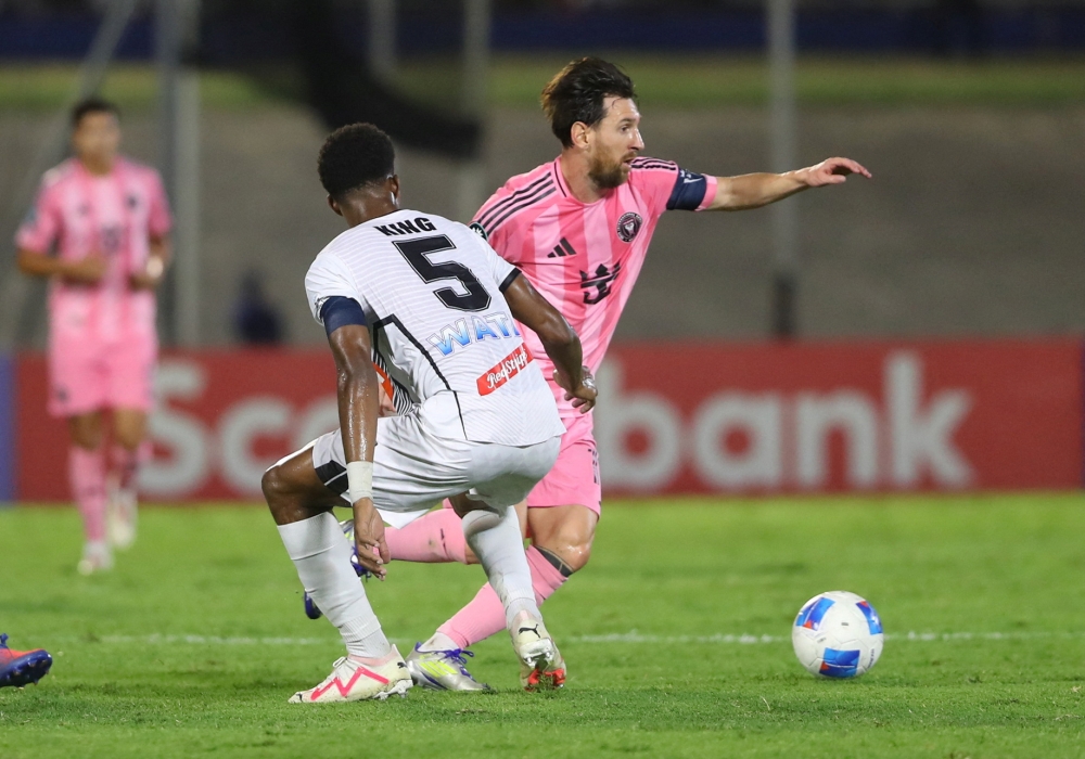 Inter Miami’s Lionel Messi in action with Cavalier’s Richard King at National Stadium Independence Park, Kingston, Jamaica, March 13, 2025. — Reuters pic 