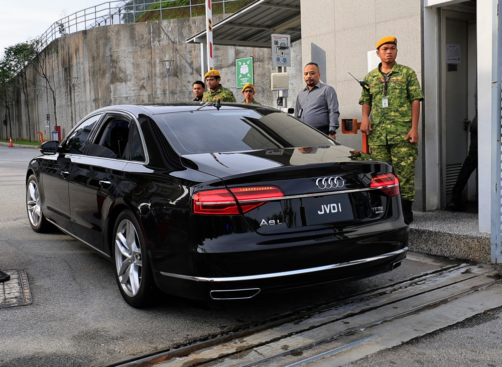 A vehicle carrying ex-prime minister Datuk Seri Ismail Sabri Yaakob is seen outside the Malaysian Anti-Corruption Commission headquarters in Putrajaya on March 14, 2025. — Bernama pic