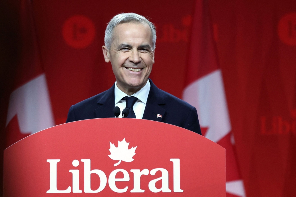 Former central banker Mark Carney will be sworn in as Canada’s next prime minister today with the country rattled by a breakdown in relations with the United States. — AFP pic