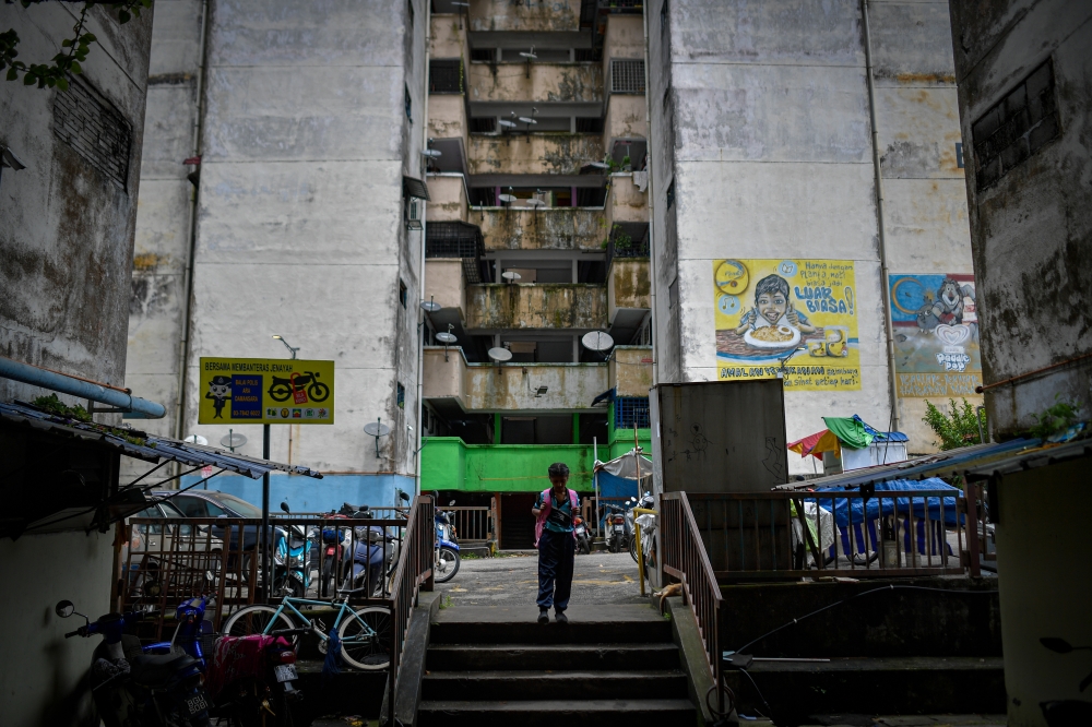 Social housing offers shelter to low-income families, but unpaid rent threatens its sustainability. — Bernama pic